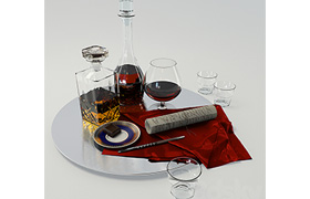 A set with a decanter of whiskey and brandy on a large platt