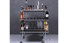 A table with alcohol and a crystal service Wine