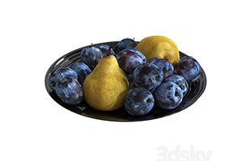 Plum and pear in a black cup