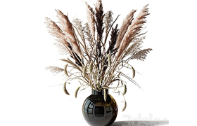 Bouquet of tall dry grass in a black vase