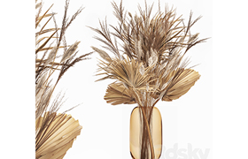 A beautiful bouquet of dried flowers in a glass vase with